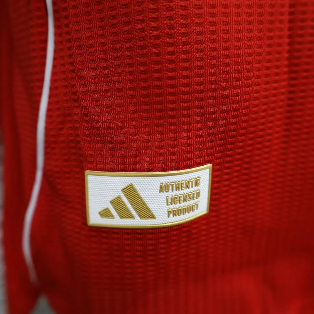 Liverpool Home shirt 25/26 player version logos