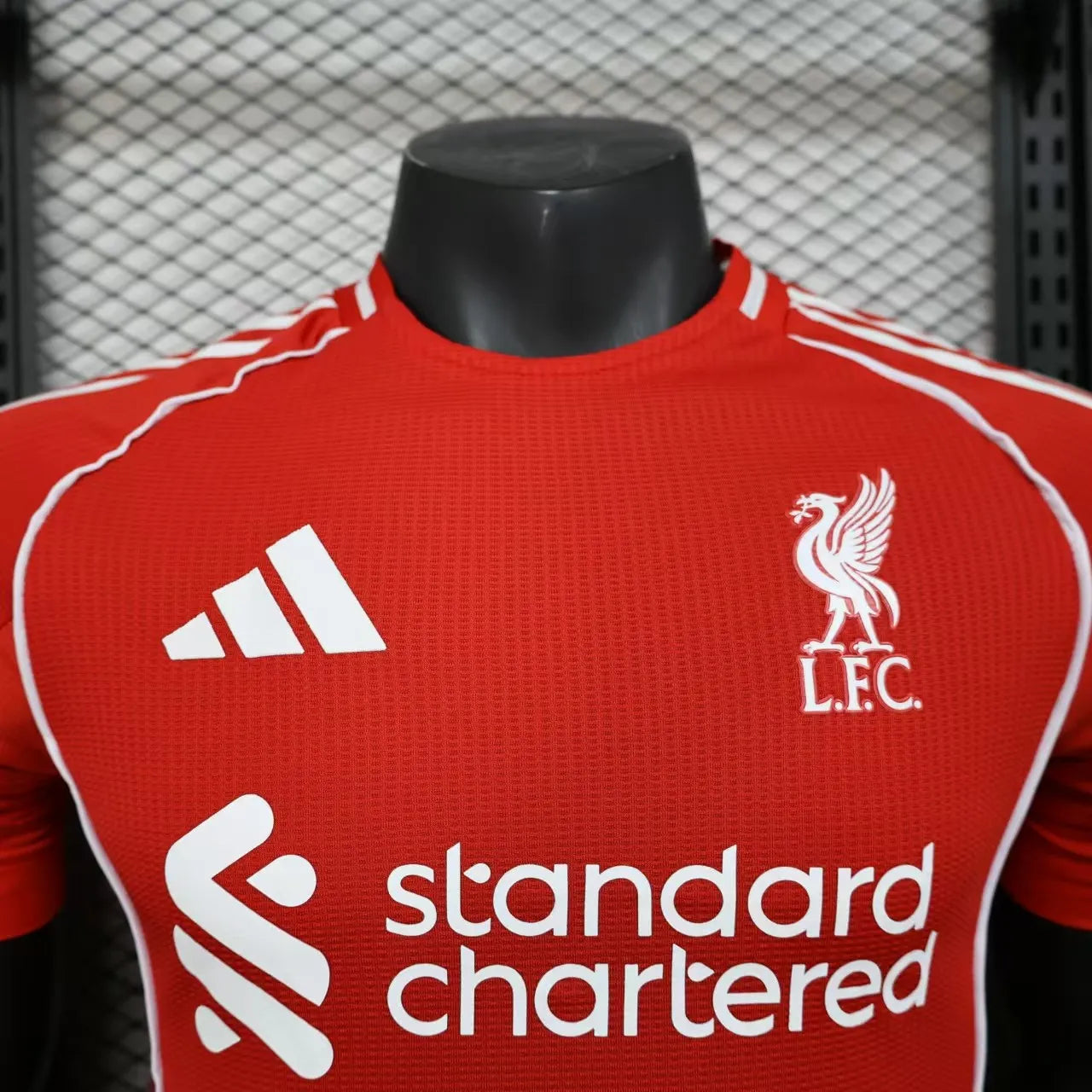 Liverpool Home shirt 25/26 player version logos